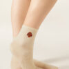 Socken mit Hundestickerei