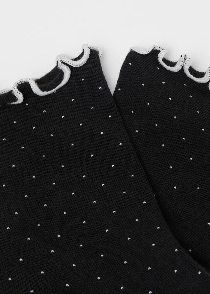 Socken mit Mikro-Punkten