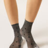 Transparente Socken mit Glitzer und Herzen