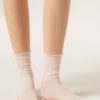 Transparente Socken mit Punktmuster