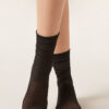 Transparente Socken mit Punktmuster